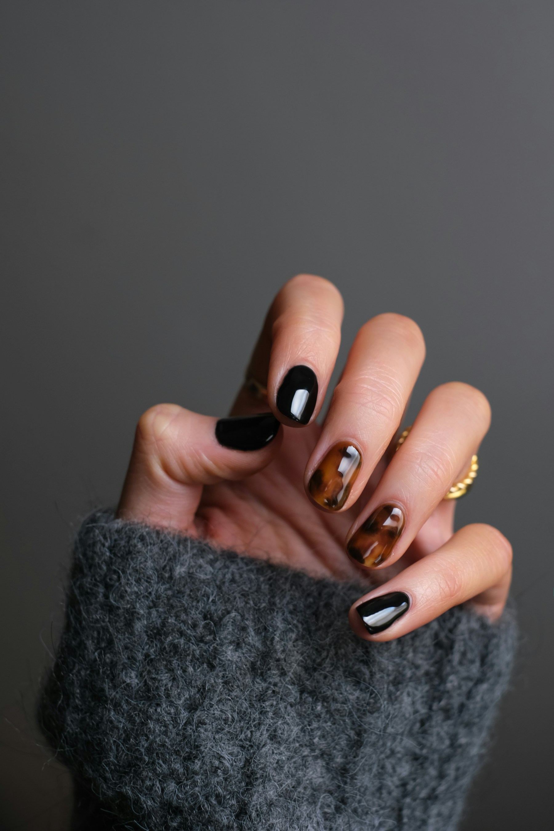Nail professional carefully working on a manicure